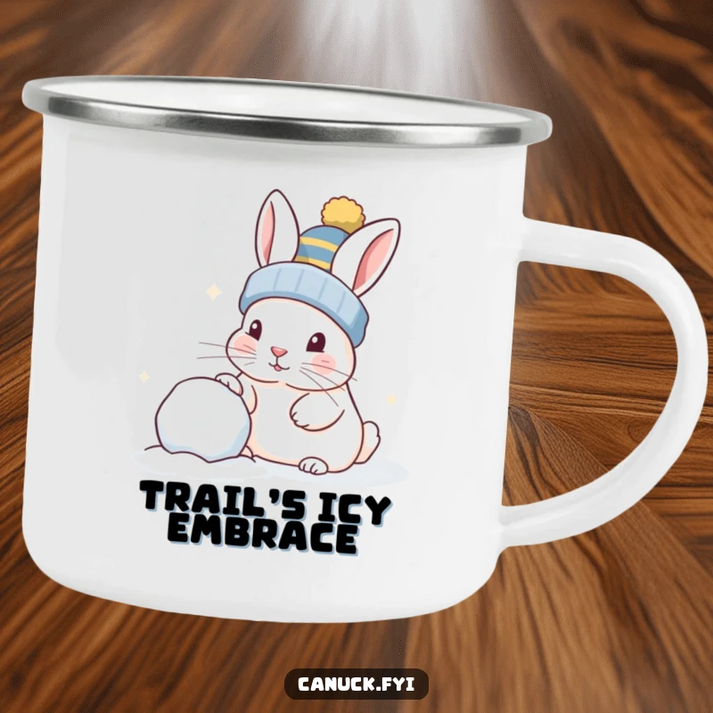 Funny rabbit in a toque, playfully nudging a snowball, enamel camping mug, durable and portable.