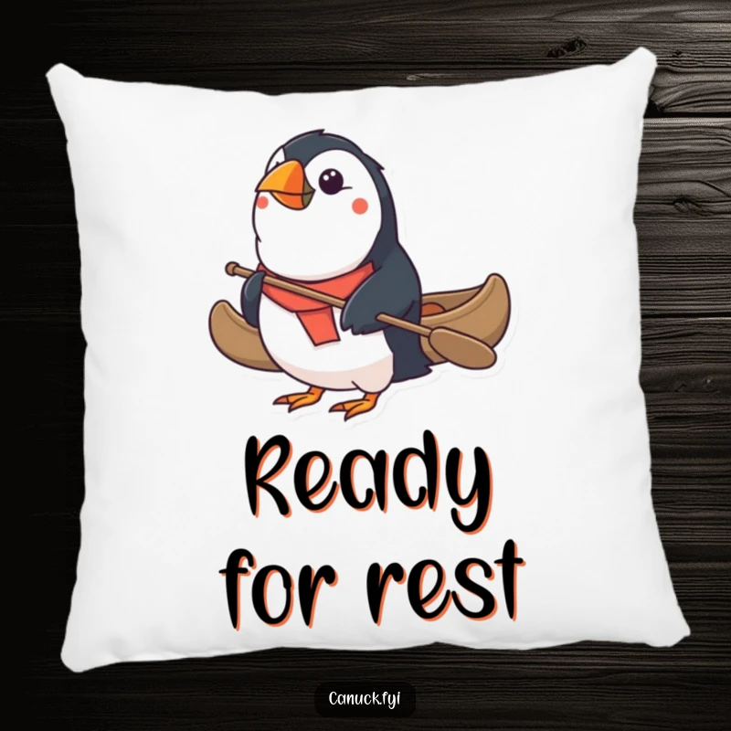 Funny Puffin Pillow: A determined puffin paddles a miniature canoe, bringing comfort and humor to any seating area. A perfect funny gift.
