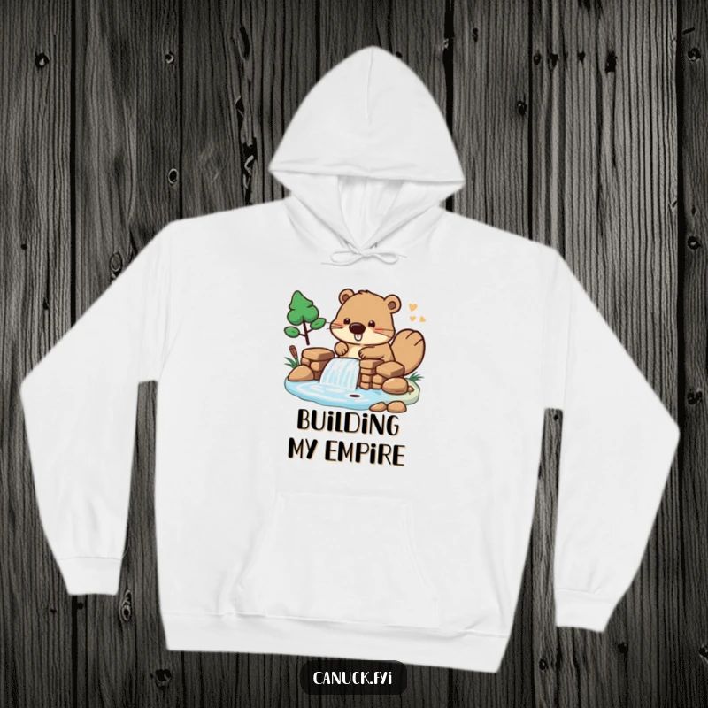 Funny Hoodie featuring a beaver character enthusiastically building a miniature dam, offering warmth and playful design.