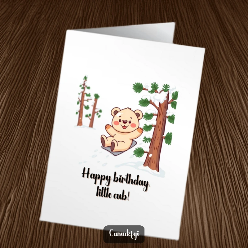 Funny free printable birthday card of a smiling bear cub gleefully sliding down a snowy pine tree, full of winter joy.