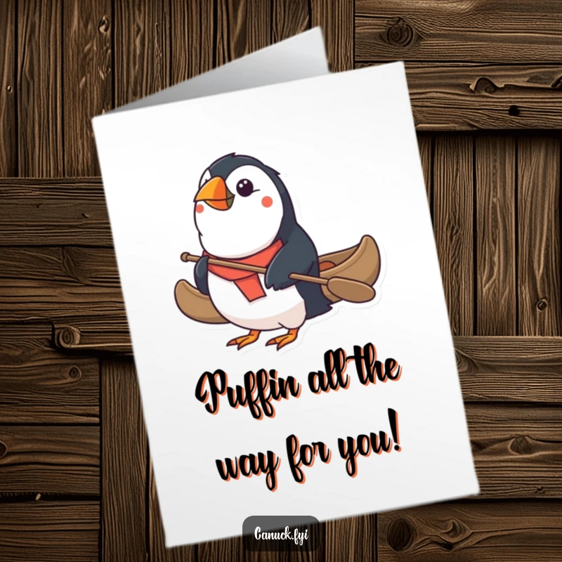 Funny Free Printable Birthday Card: Determined puffin heroically paddles small canoe, ready for adventure, a quirky downloadable gift.
