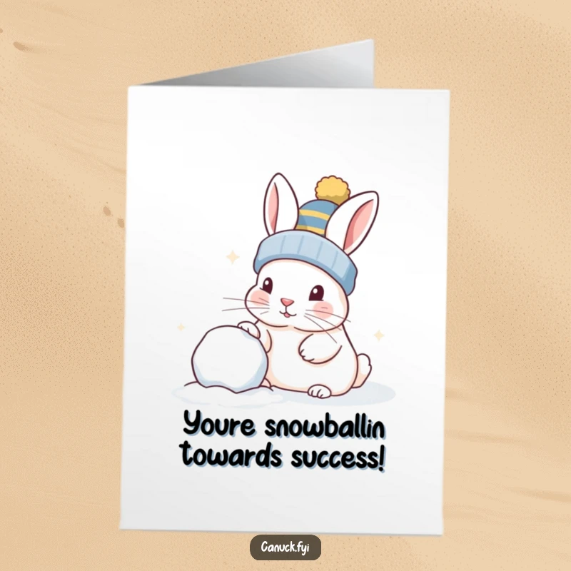 Funny Free Printable Congratulations Card: Curious rabbit in toque playfully nudging a snowball, celebrating success, downloadable greeting.